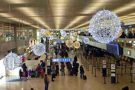 Source Genève Aéroport, halle voyageurs.